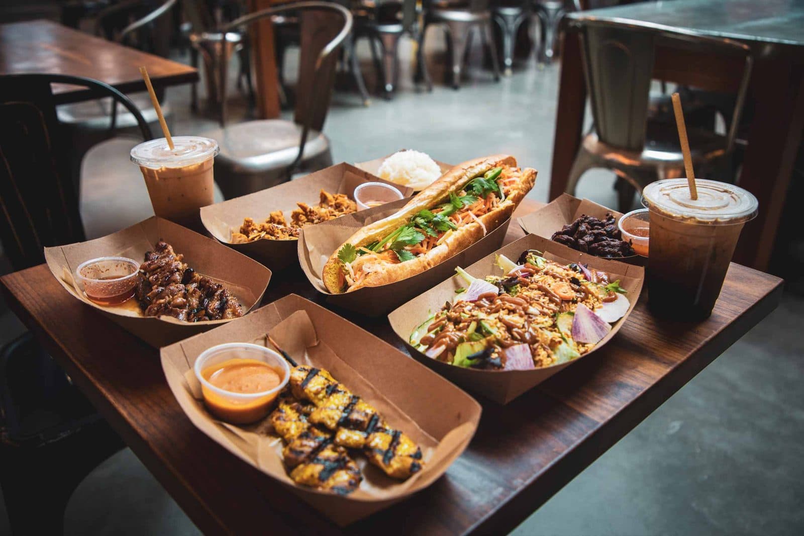 Overhead spread of dishes from Santa Barbara Public Market vendors
