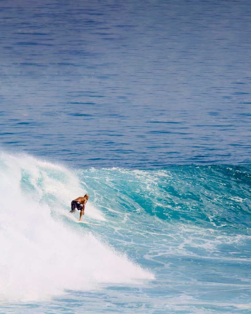 Nick Cabugos surfing a wave